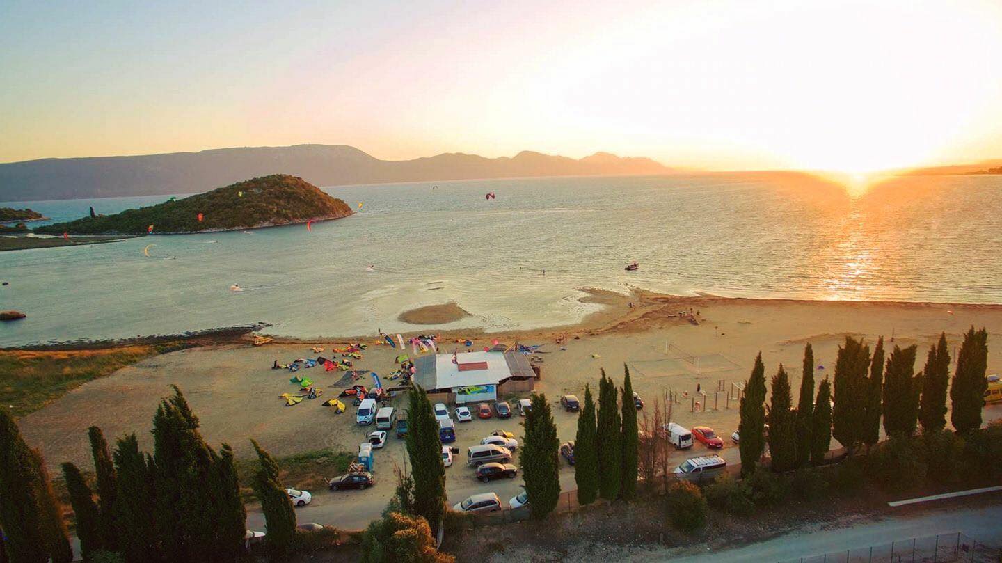 Kitesurfing on the Neretva lagoon under windy sky
